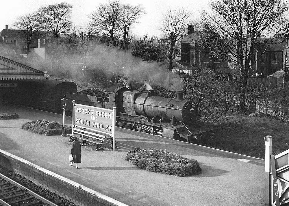 Ex-GWR 2-6-0 43xx Class No 6349 is seen arriving at platform 1 with the 6:05pm Snow Hill to Leamington service on 21st April 1960