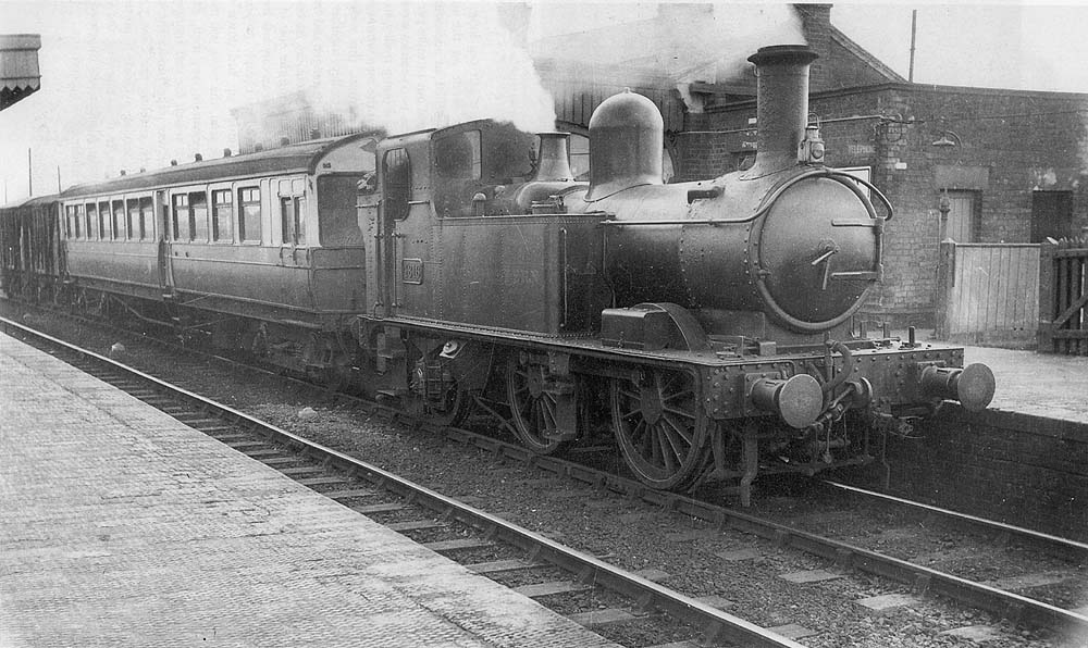 Collett 48xx class 0-4-2T No 4816 arrives at Bearley with a mixed train from Alcester on 2nd August 1938