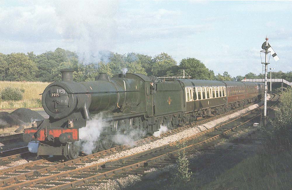British Railways built GWR 4-6-0 Hall class No 7915 'Mere Hall' is seen having restarted the 11 05 Illfracombe to Wolverhampton express service