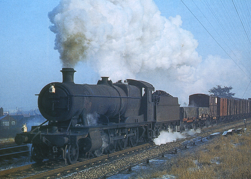 Ex-GWR 2-8-0 28xx class No 2886 is seen passing Warwick Common as it begins its ascent of Hatton Bank on 21st December 1963
