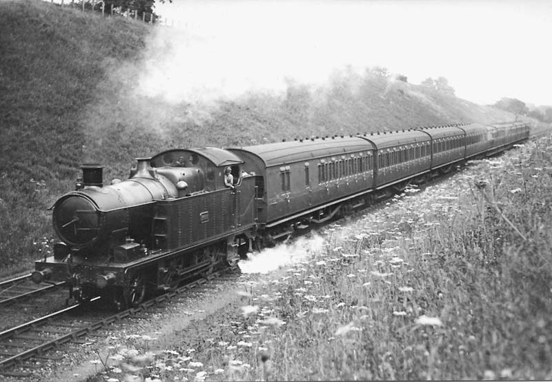 GWR 36xx Class 2-4-2T No 3606 heads a down local passenger service to Snow Hill from Leamington