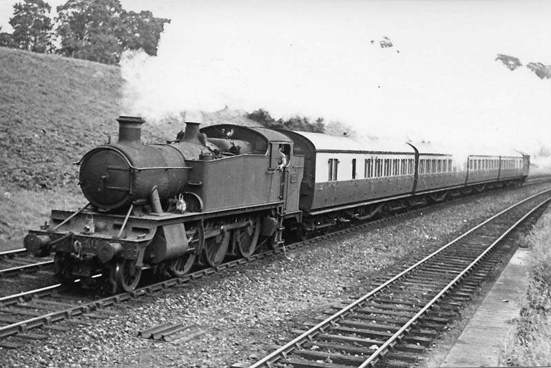 An unidentified 5101 Class 2-6-2T locomotive sprints up Hatton Bank with a Leamington to Snow Hill local passenger service