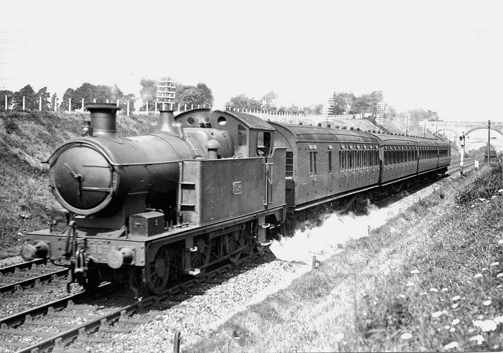 GWR 2-4-2T 36xx Class No 3624 is seen on a four coach Birmingham to Leamington passenger service