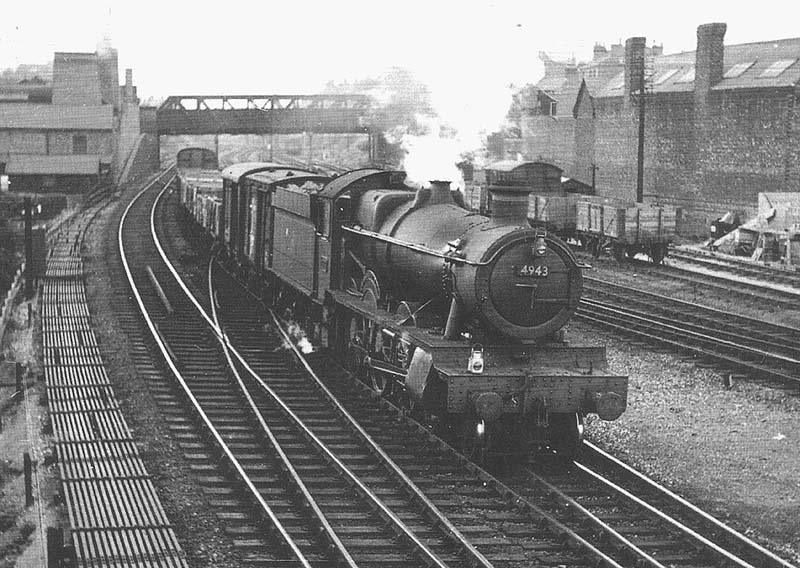 Ex-Great Western Railway 49xx (Hall) class 4-6-0 No 4943 Marrington Hall passes over the main to relief line crossovers