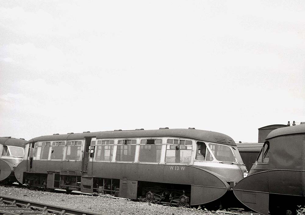 A later view of ex-GWR Railcar No 13 sandwiched between another member of the class and the express parcel Railcar in 1960
