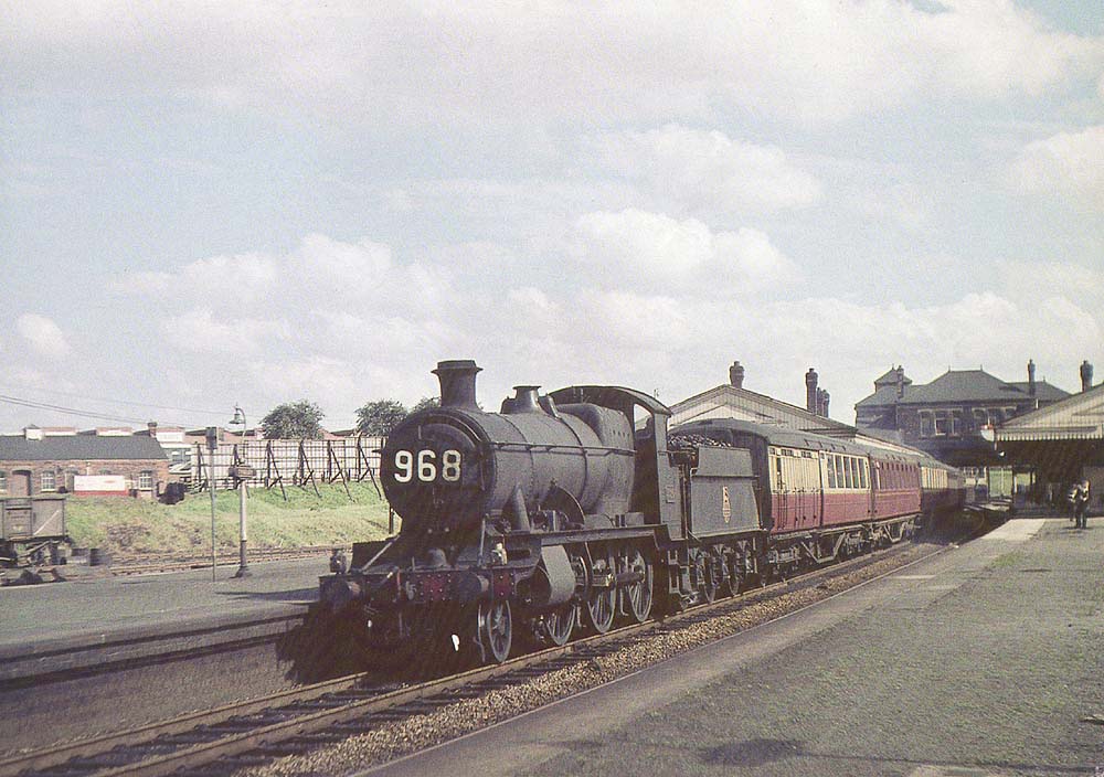 Ex-GWR 2-6-0 'Mogul' No 5380 is seen at the head of down excursion train originating from the south coast train on a holiday special