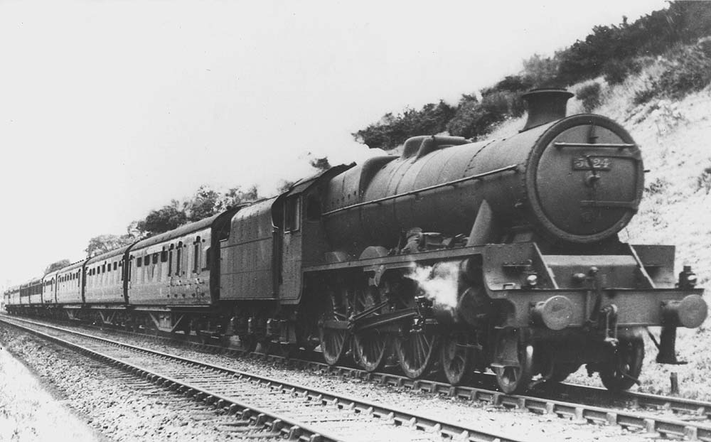 LMS 5XP 4-6-0 Jubilee class No 5624 'St Helens' is seen at the head of an up express as it enters Beechwood tunnel cutting south of Berkswell