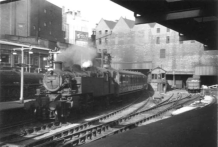 Ex-LMS 2MT 2-6-2T No 41226 is seen arriving at Platform 5 with a local passenger service probably originating from Sutton Coldfield