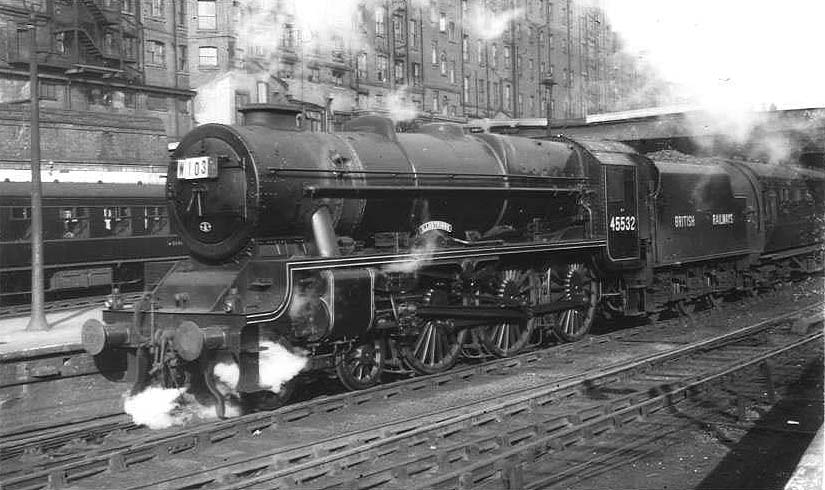 Ex-LMS 6P 4-6-0 No 45532 'Illustrious' is seen wearing 1946 LMS black lined livery as it stands at Platform 5 on a Wolverhampton express