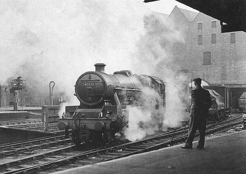 Ex-LNER 4-6-0 'B1' No 61325 and ex-LMS 5P4F 2-6-0 'Crab' No 2758 are seen from Platform 10 at the West End of New Street station during April 1949