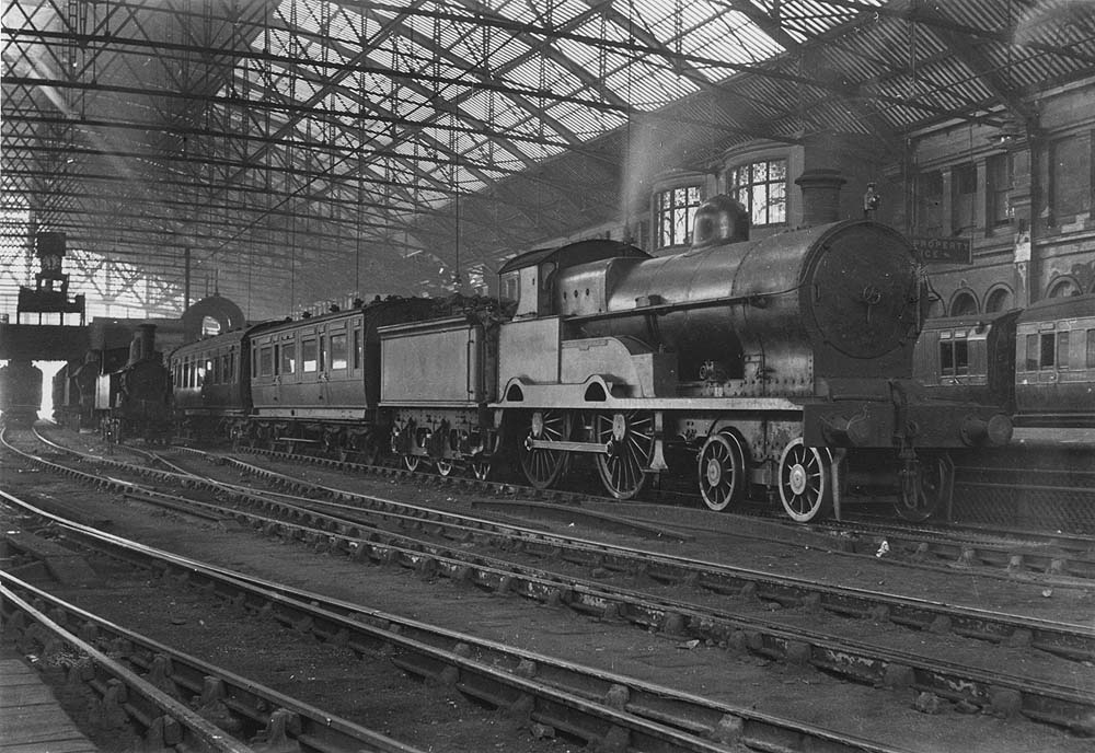 Ex-LNWR 4-4-0 George the Fifth class No 5331 'JP Bickersteth' is seen arriving at Platform 1 at the head of a Birmingham to Rugby local passenger service