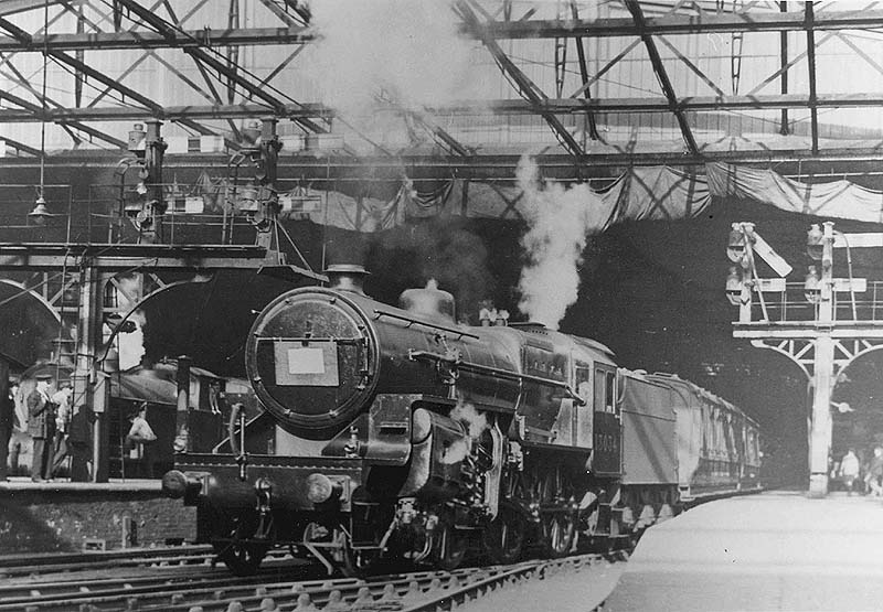 LMS 5P4F 2-6-0 'Horwich Crab' No 13034 is seen departing the West end of Platform 3 whilst at the head of a Wolverhampton express service
