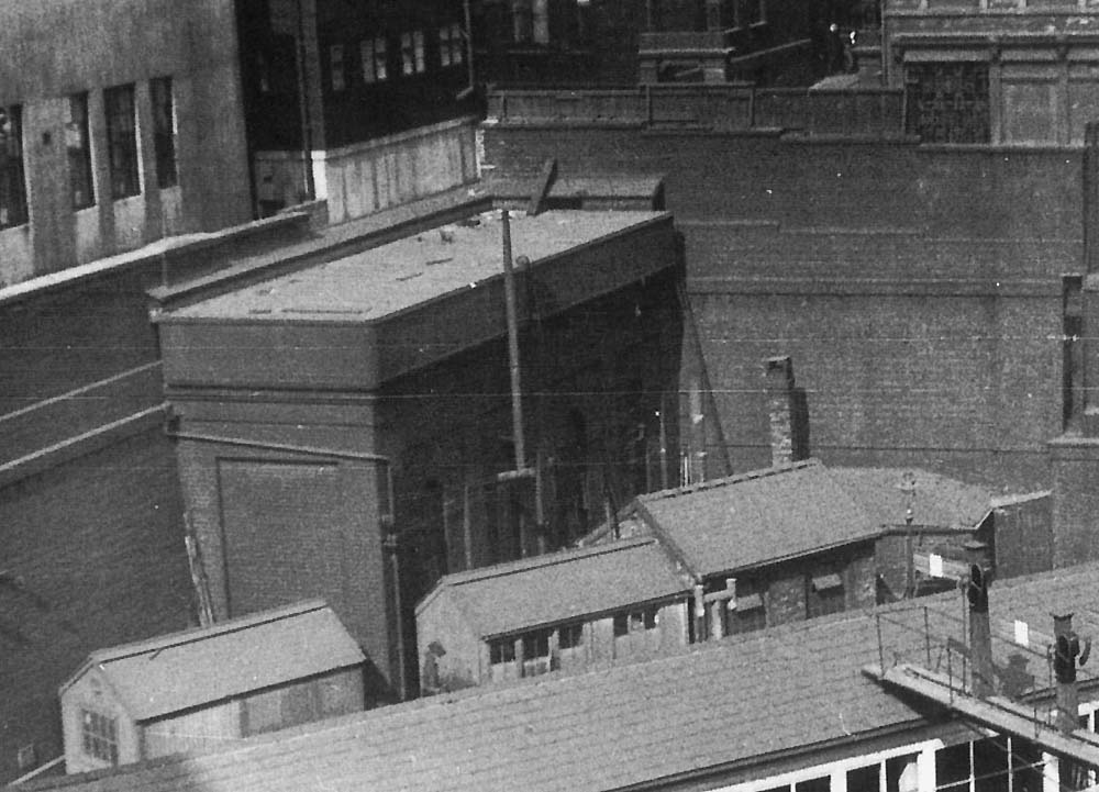 Close up showing the water tank and Permanent Way buildings erected behind New Street No 5 Signal Box and adjacent to Hill Street