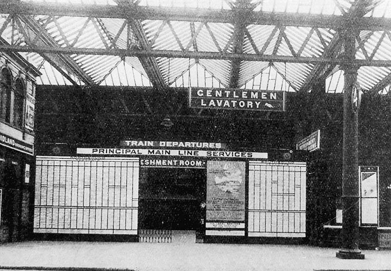 View of the LMS's 1928 Timetable and Departure Information Board located at the entrance to Platform 4 off Queens Drive