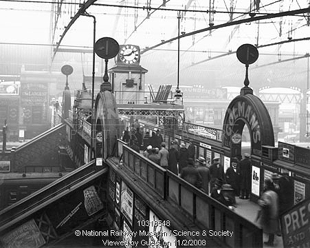 View of New Street No 3 Signal Cabin showing the addition of the four-sided clock prior to the erection of the new sides and tarpaulin roof