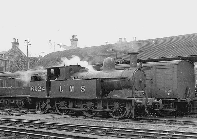 Ex-LNWR 0-6-2T 2P Watford tank No 6924 is seen standing in the parcels bay after completing shunting duties