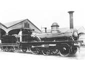 LNWR Stephenson long boiler 2+2-2-0 No 189 seen standing in front of the now closed Curzon Station circa 1959