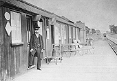 An Edwardian view looking towards Weeden showing in the distance a train approaching the single line platform which is seen on the left