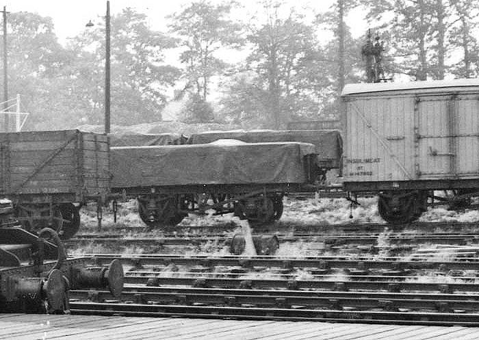 Close up showing post-Second World War wagons and vans in transit between the former LNWR and the GWR routes