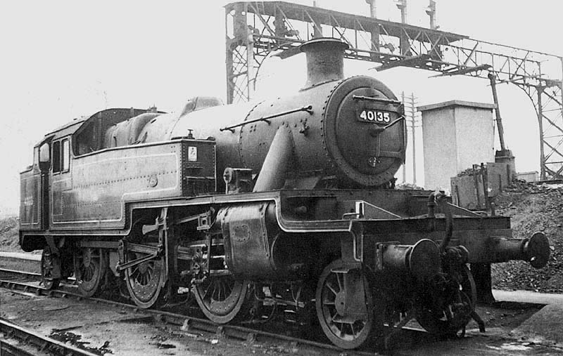 Ex-LMS 3MT 2-6-2T No 40135 is stabled outside Nuneaton shed adjacent to the Trent Valley line