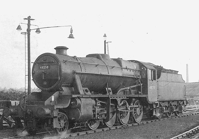 Ex-LMS 8F 2-8-0 No 48258, with Fowler 3500 gallon tender, is seen getting preparing to leave the shed
