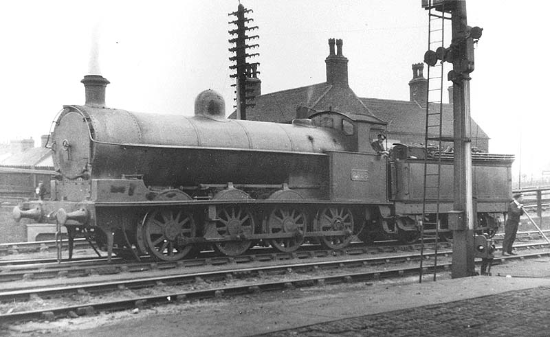 Ex-LNWR 0-8-0 7F No 2526 is seen light engine alongside the hump at Nuneaton's up marshalling yard during shunting duties