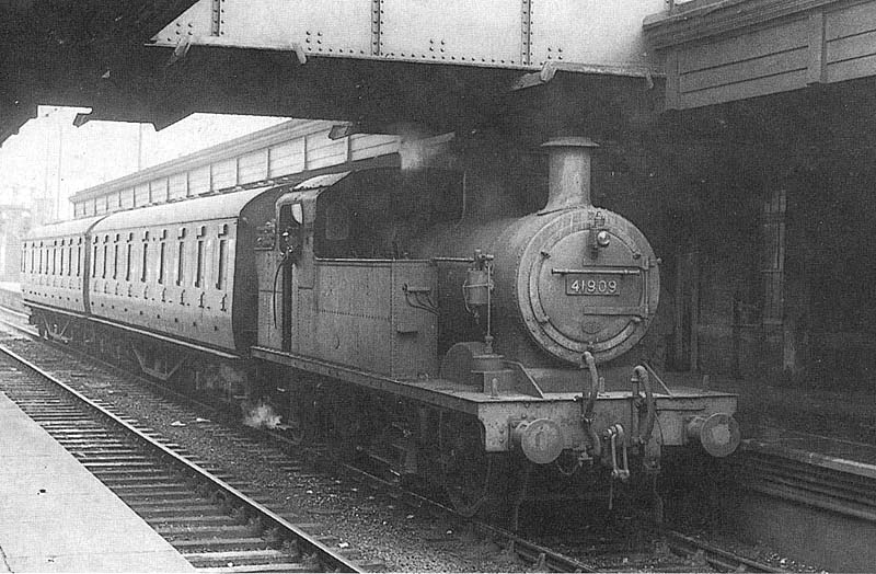 Ex-LMS 2P 0-4-4T No 41909 stands with a two-coach local passenger service at Platform One in 1957