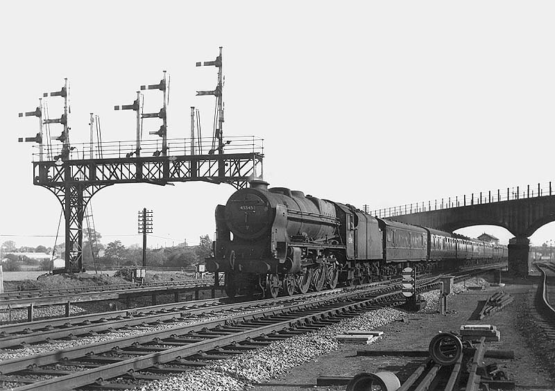 Rebuilt ex-LMS Patriot class No 45545 'Planet' is seen passing under the Midland Railway's Birmingham to Leicester line