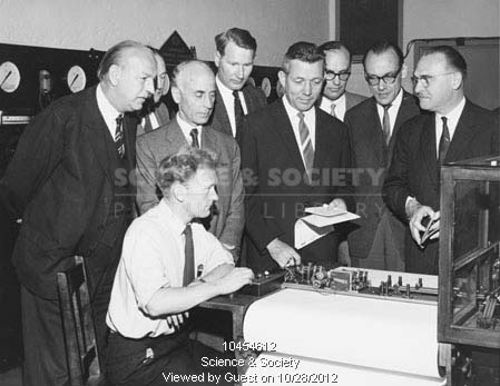 A group of railway officials pose inside Rugby's Locomotive Testing Station's control room on 20th July 1962