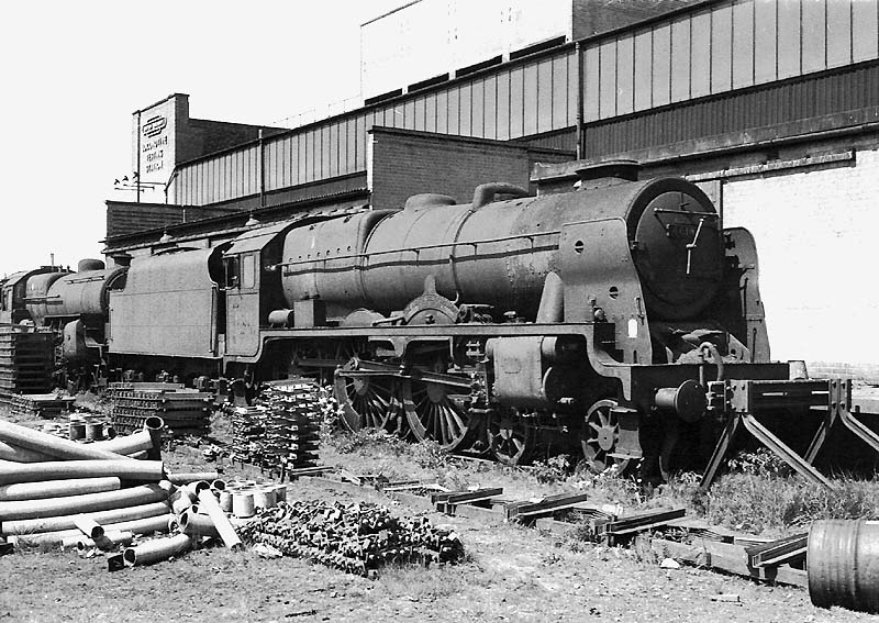 Ex-LMS 4-6-0 Royal Scot Class No 46141 'The North Staffordshire Regiment' stands outside of Rugby Testing Station in 1963