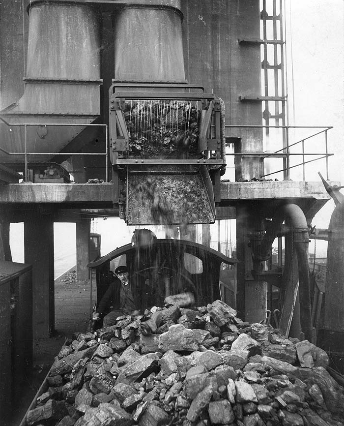 View of an unknown locomotive being coaled at Rugby's LMS coaling plant built in the 1930s