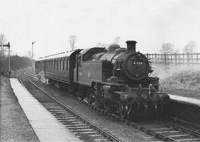 British Railways built 2MT 2-6-2T No 41228 is seen entering Southam and Long Itchington station on 2:37pm Leamington Avenue to Weeden service on 18th January 1958
