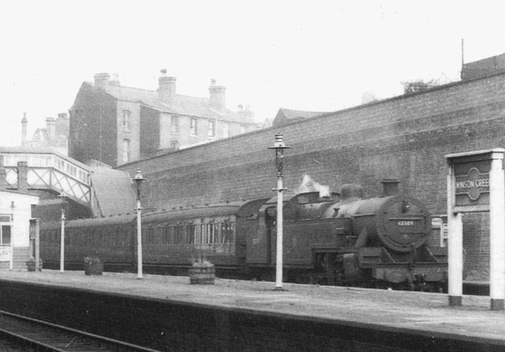 Close up showing ex-LMS 2-6-4T 'Fowler' tank locomotive No 42309 entering the station with a local passenger service to New Street station