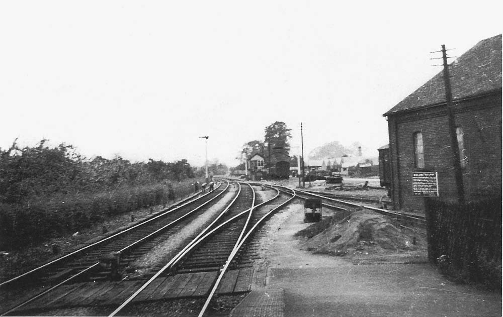 Looking north during the 1930s towards Redditch from the down platform with the goods shed seen on the right