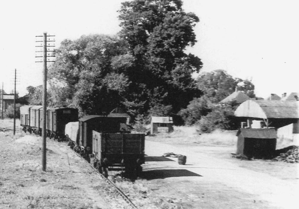 Close up showing the connecting through siding and coal stacking area and the hut occupied by Shrimptons and Butlers coal merchants
