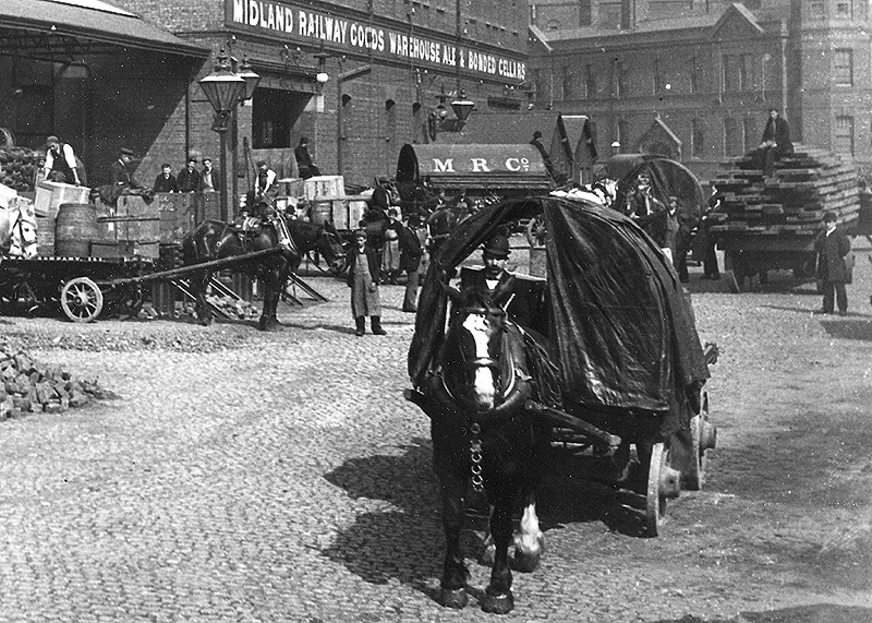 Close up view showing the horse-drawn vehicles employed by the MR for delivering goods to its customers or its customers' customers