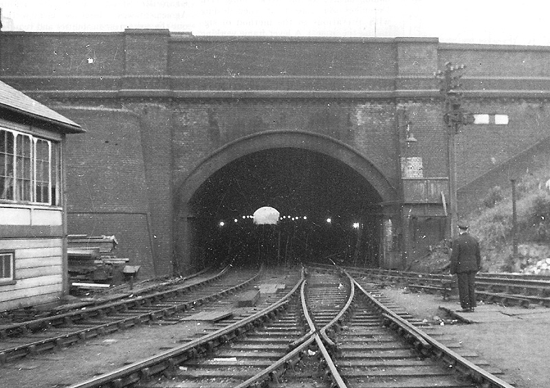 View of Granville Street's goods tunnel mouth showing the lights on either side and the point work within the tunnel itself