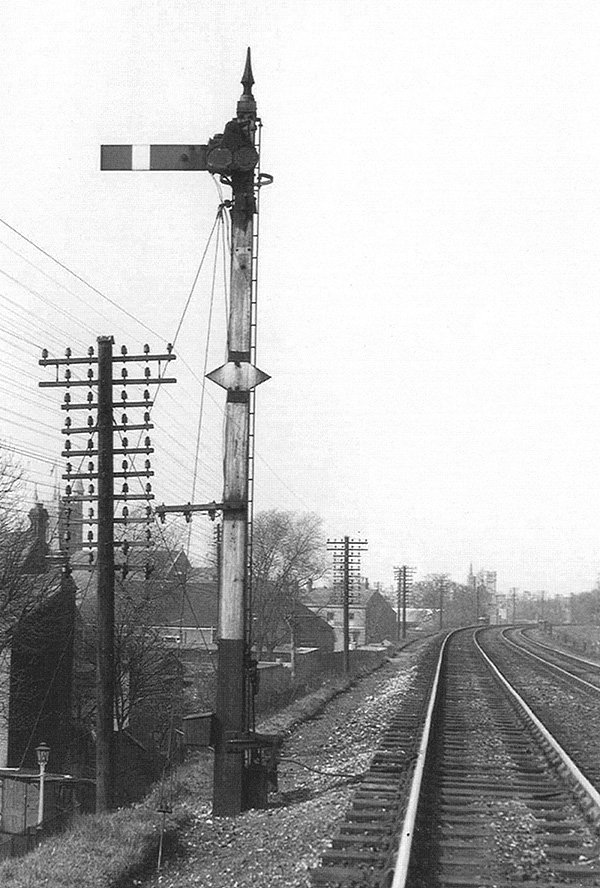 View of Camp Hill's up outer home signal which comprises the original Midland Railway post with a LMS upper quadrant arm