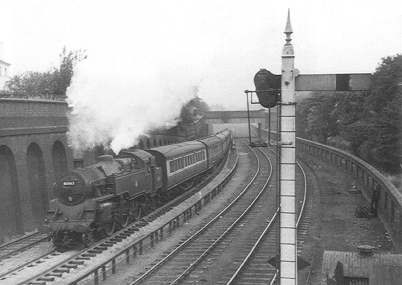 British Railways Standard Class 4MT 2-6-4T No 80063 is seen on a down passenger service circa 1953