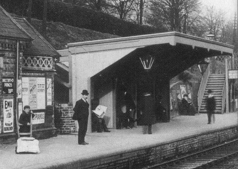 Close up showing Kings Heath station's basic timber waiting shelter which was erected in 1869