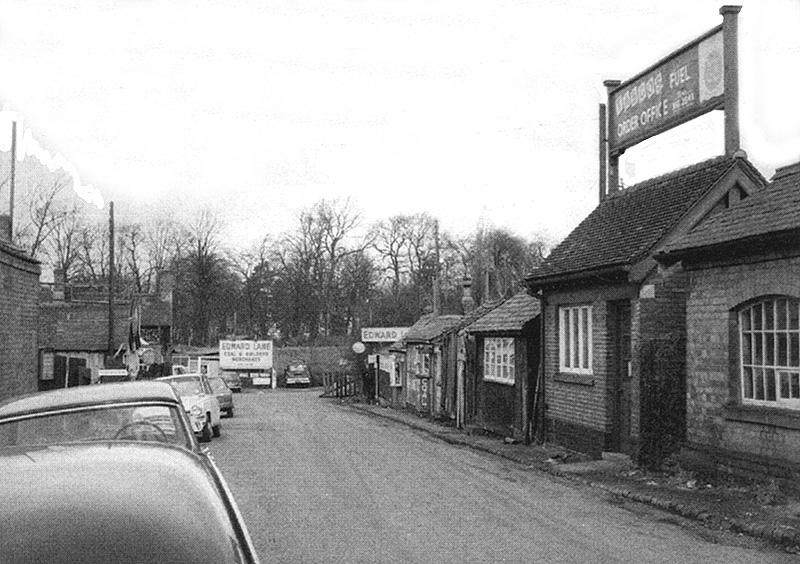 Looking down Station Drive from the High Street towards the station yard with offices of coal merchants all on the right