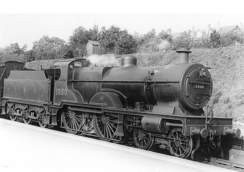 LMS 4-4-0 'Compound' 4P No 1050 stands at the up West Suburban platform on 24th September 1932