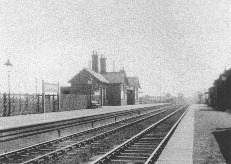Looking from the up platform towards Kings Norton with Lifford Station Junction signal box in the distance on the left