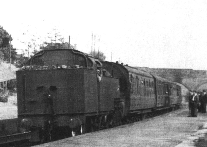 LMS 4P 2-6-4T No 2337 runs bunker first in to Penns station