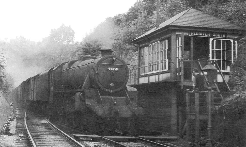 Ex-LMS 4-6-0 5MT No 44859 is seen passing Redditch South Signal Box  with a Class H freight service