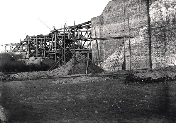 View of the completed brick abutment and the temporary timber scaffolding used on the bridge spanning the Oxford Canal on 13th March 1897