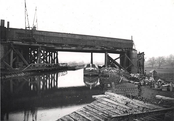 A later view of the bridge being built to cross the Oxford Canal showing the steel beams nearly complete circa 1897