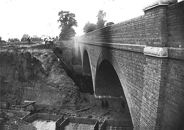 View showing how Ashlawn Road's three-arch brick built overbridge was erected in advance of the excavation of the line