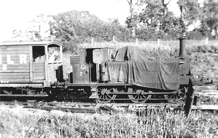 EHLR 0-6-0T No 2 is seen coupled to the brake van whilst being protected from the elements with a tarpaulin