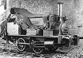 EHLR 0-4-0ST 'Sankey' is protected from the elements both by a tarpaulin as well as standing under the bridge